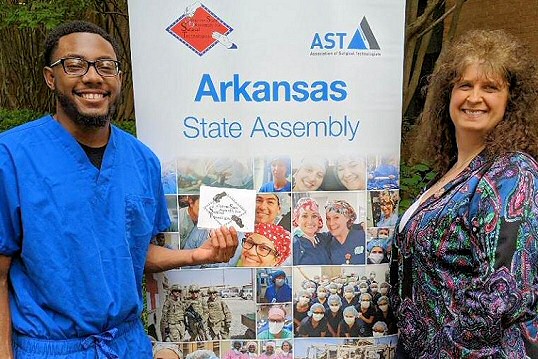 ARSA President Cindy Lewis (right) stands with Daniel Castleberry Memorial Scholarship winner J'Quan Brammer (left).